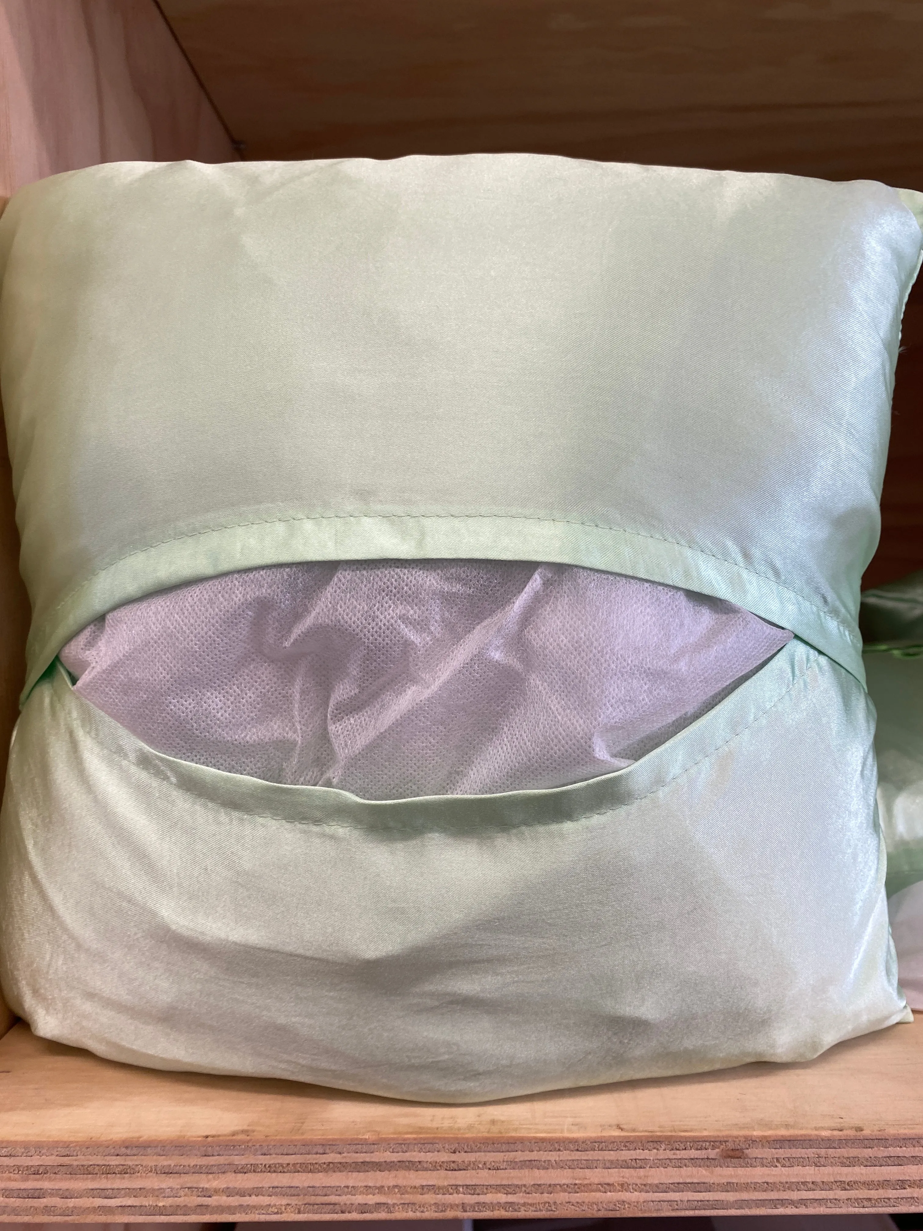 Holy Cross Embroidered Satin Pillow by Shiloh Sagapolu