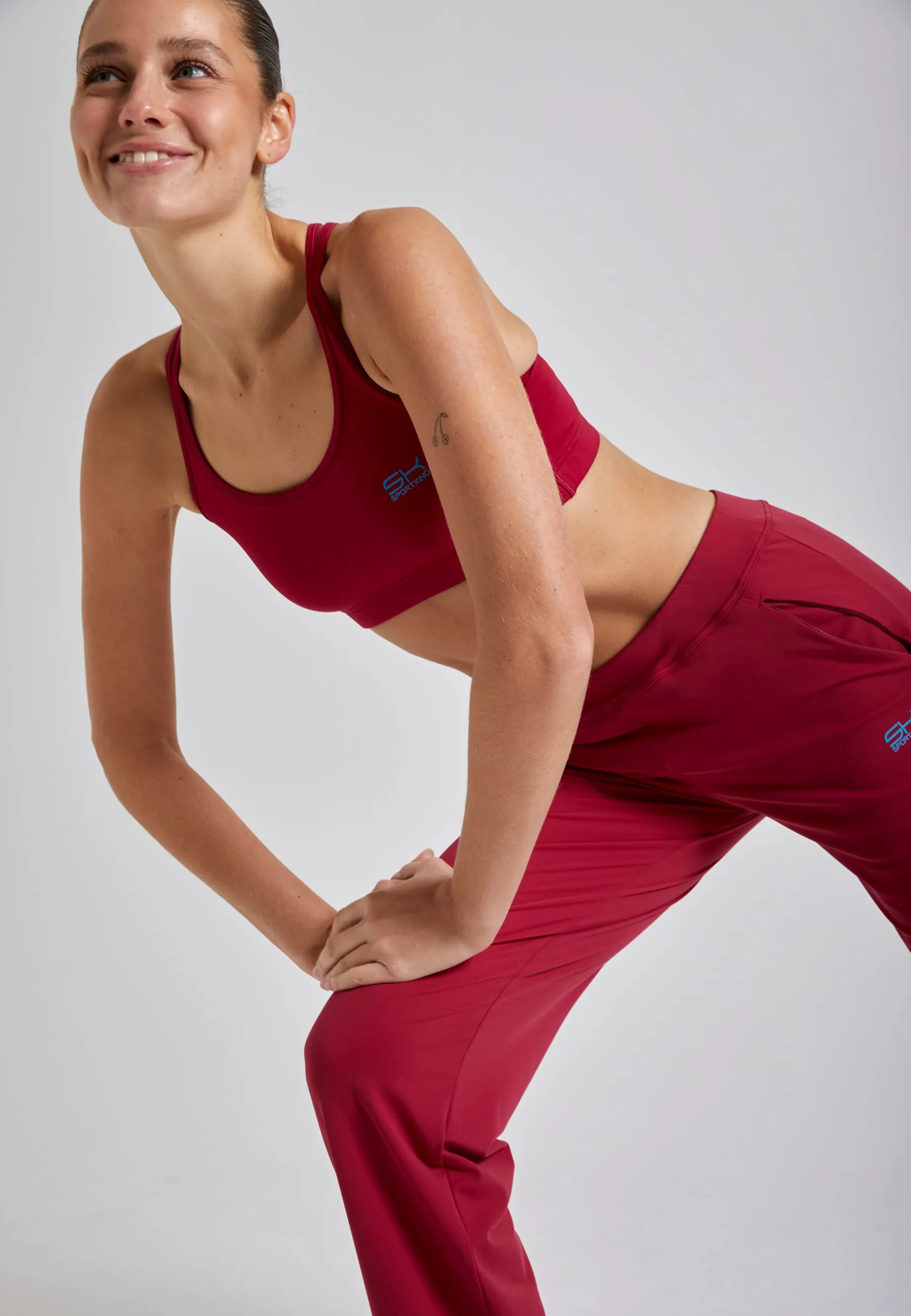 Tennis training pants long, burgundy red